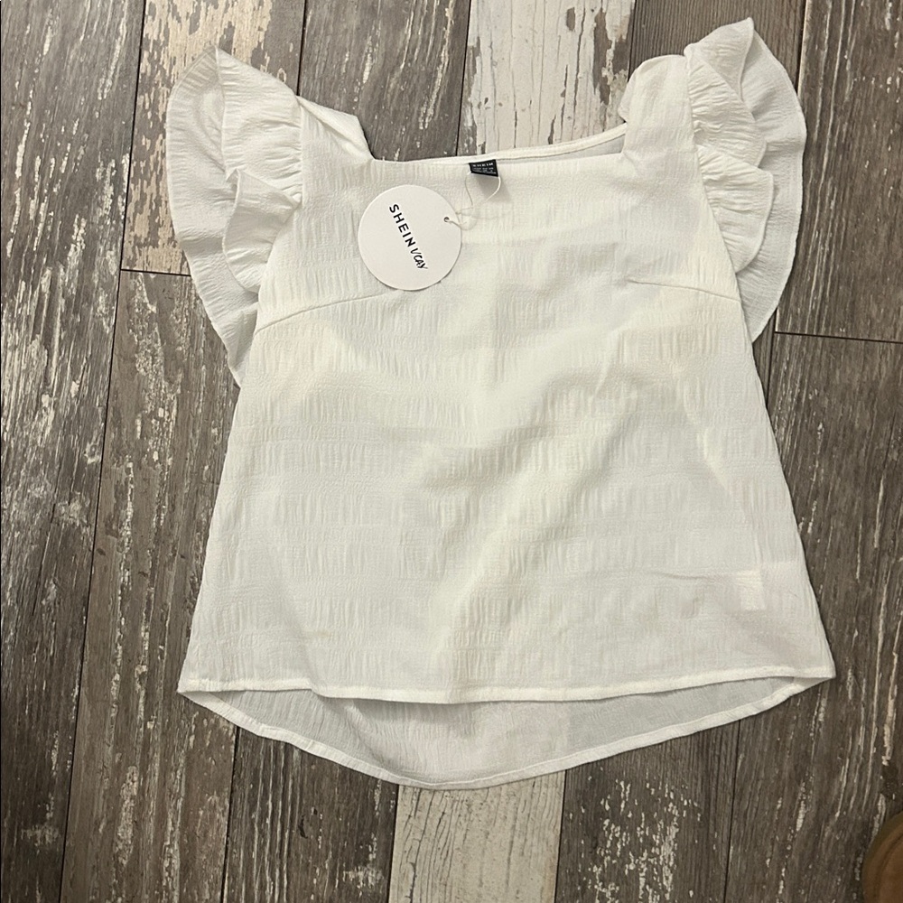 SHEIN White ruffle sleeve linen top
NEVER WORN WITH TAGS